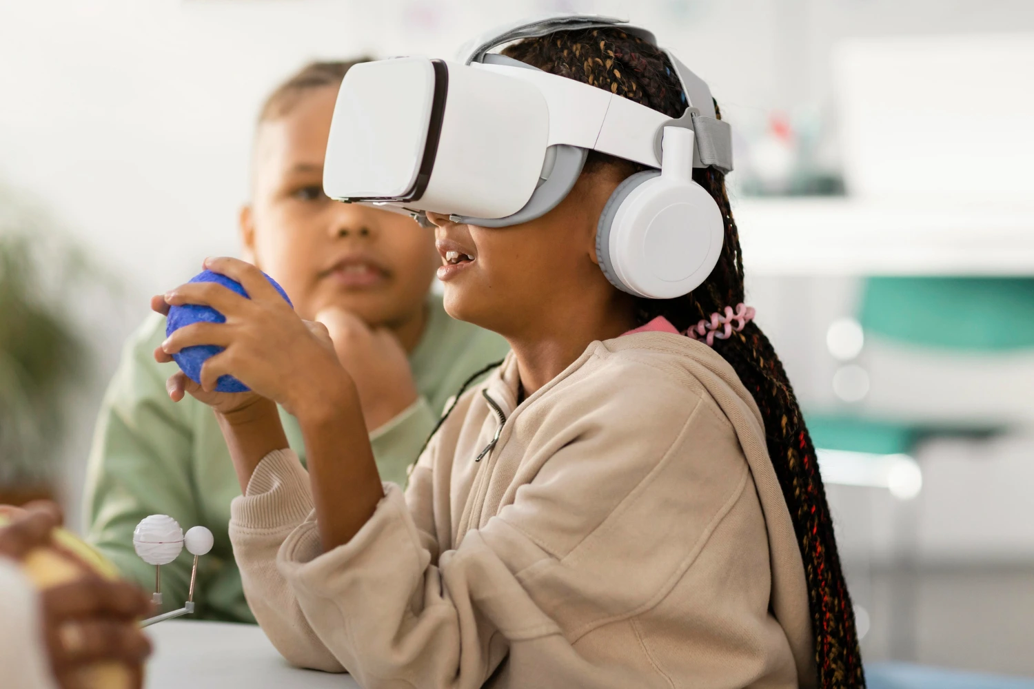 A young girl immersed in a virtual reality experience, wearing sleek VR glasses and engaging with a digital environment.